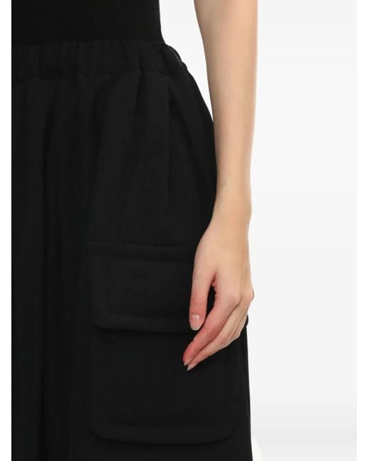 Falda midi con cinturilla elástica Comme des Garçons de color Black