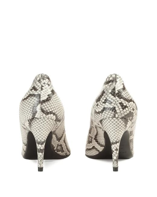 Sergio Rossi White Evolv Buckle Pumps