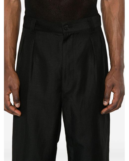 Comme des Garçons Black Pleated Tapered Trousers for men