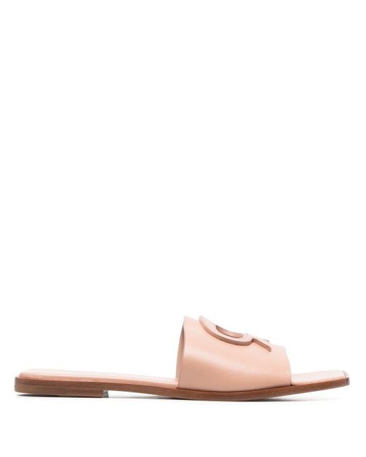 initials insignia cutout leather slides