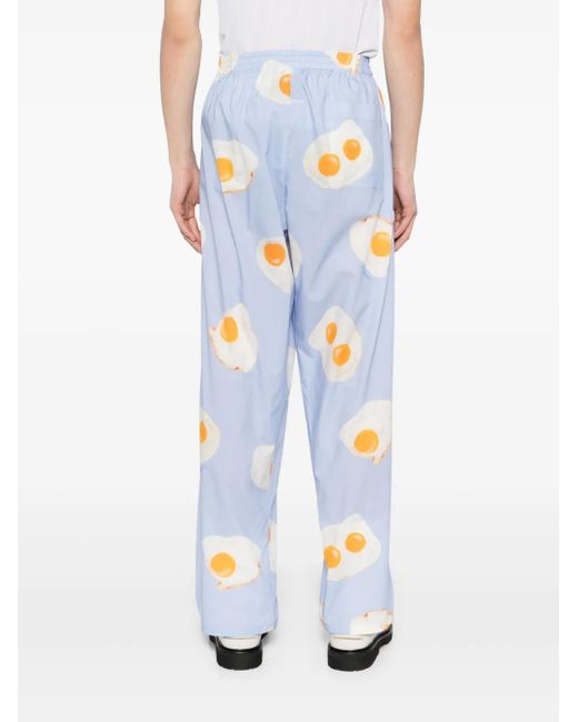 Moschino Blue Graphic-Print Trousers for men