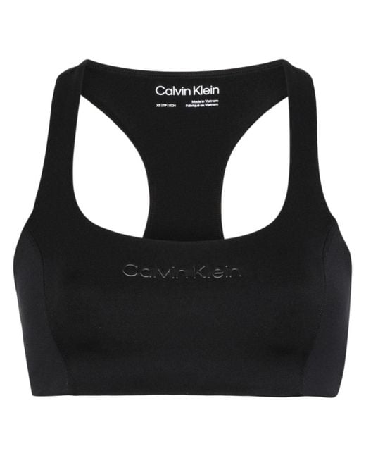 Brassière de sport à logo appliqué Calvin Klein en coloris Black