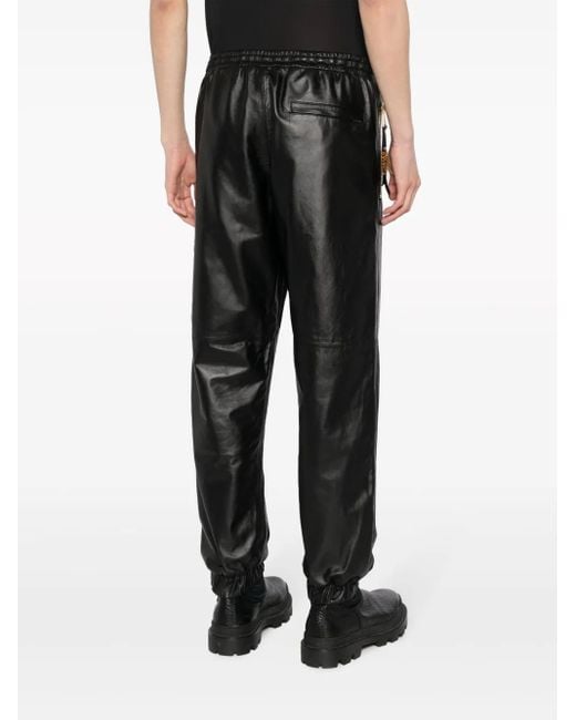 Moschino Black Cropped Leather Track Pants for men