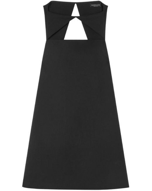 Vestido corto con aberturas Versace de color Black