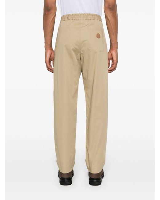 Pantalones ajustados con aplique del logo Moncler de hombre de color Natural