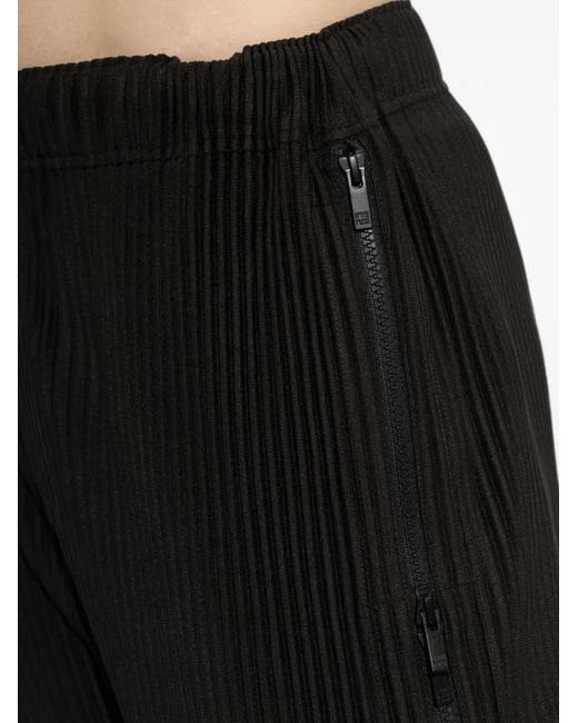 Homme Plissé Issey Miyake Black Zip-Pockets Pleated Trousers for men