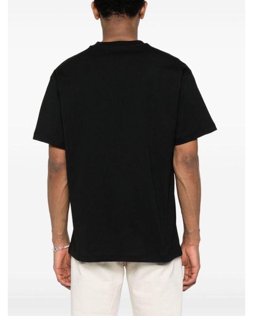 Camiseta con estampado gráfico Versace de hombre de color Black