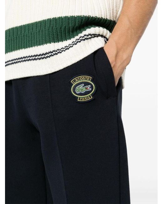Pantalon à patch logo Lacoste pour homme en coloris Blue