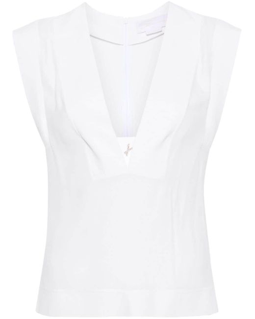 Blusa smanicata con logo di Genny in White