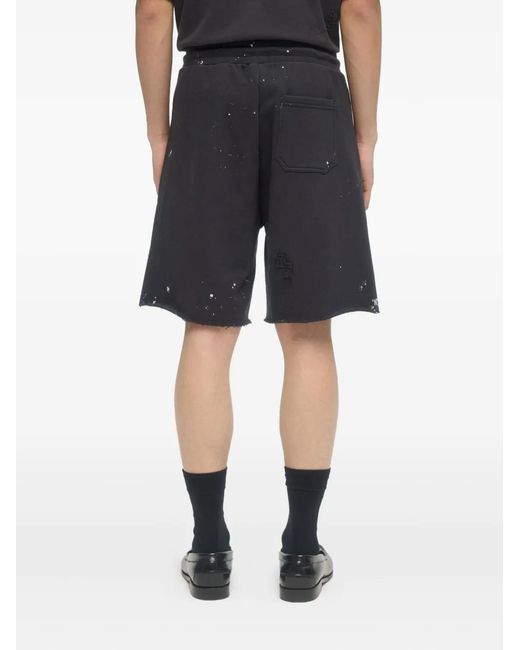 DOMREBEL Blue Paint-Splatter Sweatshorts for men