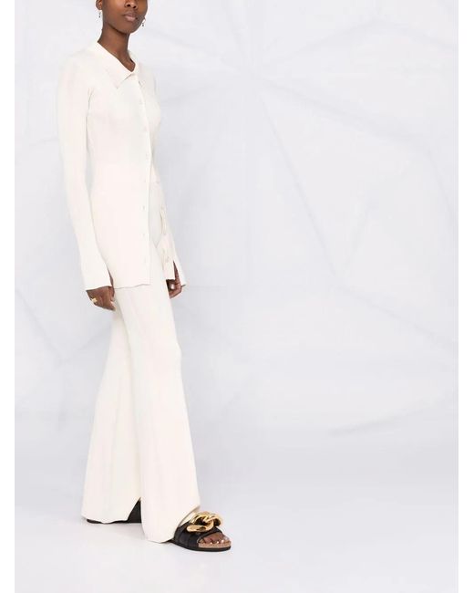 Remain White Fine-Ribbed Flared Trousers