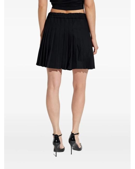 Minifalda Plisada Versace de color Black