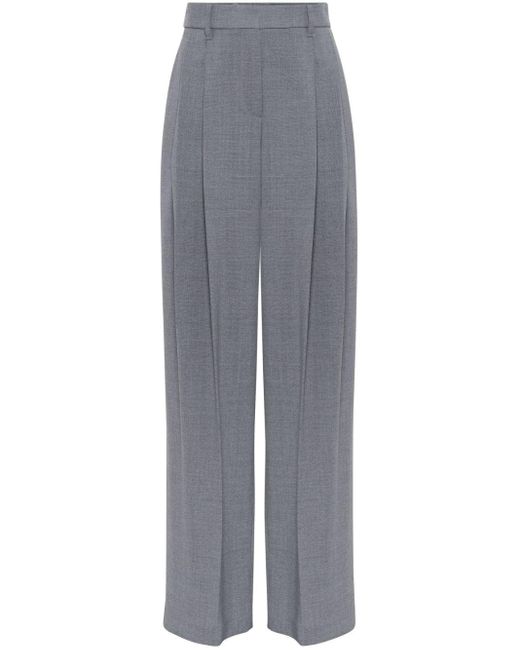 Pantalon en laine à coupe ample Brunello Cucinelli en coloris Gray