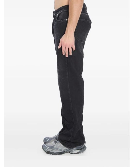 Balenciaga Black Logo-Patch Distressed Jeans for men