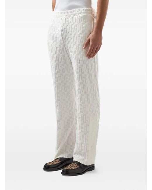 Gcds White Monogram-Pattern Trousers for men