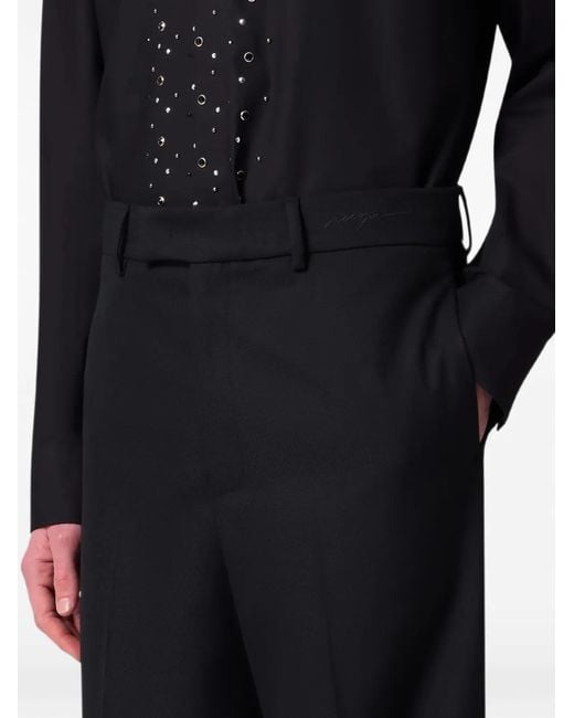 MSGM Blue Logo-Embroidered Pressed-Crease Trousers for men