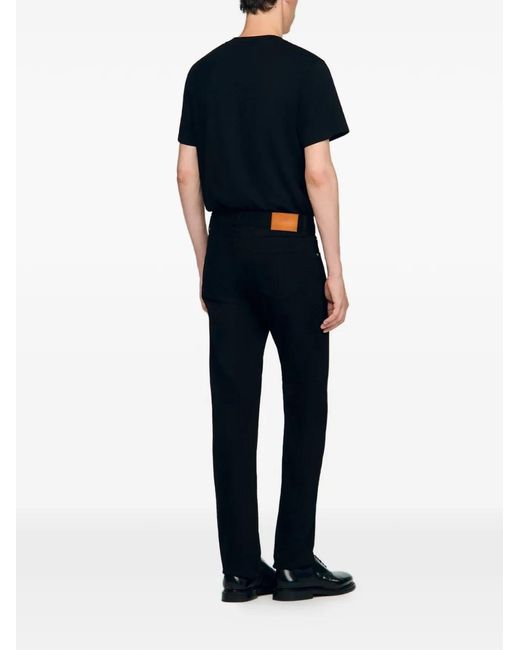 Vaqueros Skinny Con Trabillas Sandro de hombre de color Black