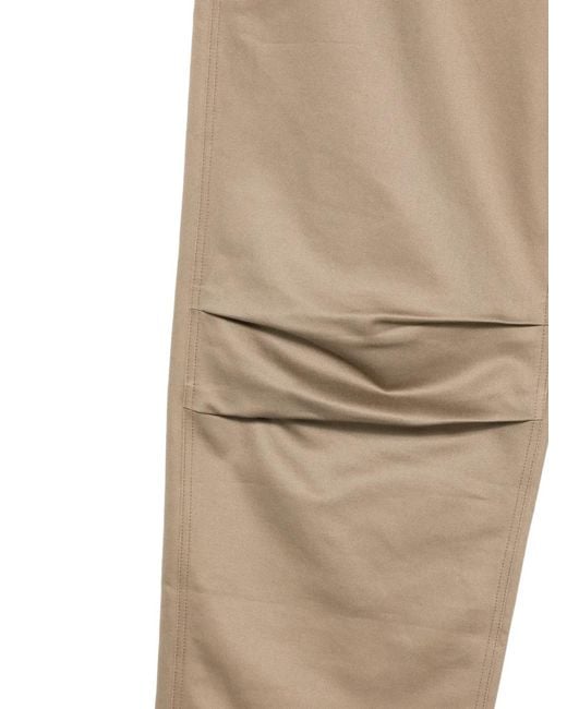 ANDERSSON BELL Natural Logo-Patch Panelled Trousers for men