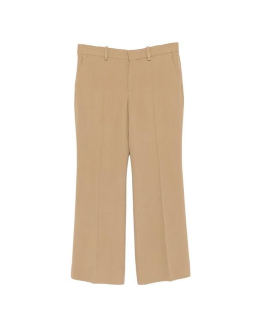 Totême Natural Kick Pressed-Crease Flared Trousers