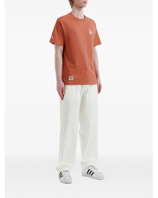 Chocoolate White Logo-Patch Trousers for men