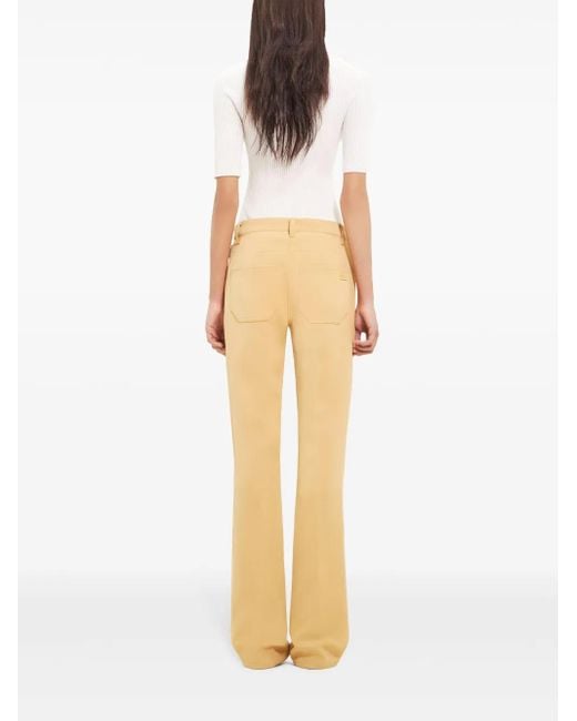 Courreges Natural Low-Rise Bootcut Trousers