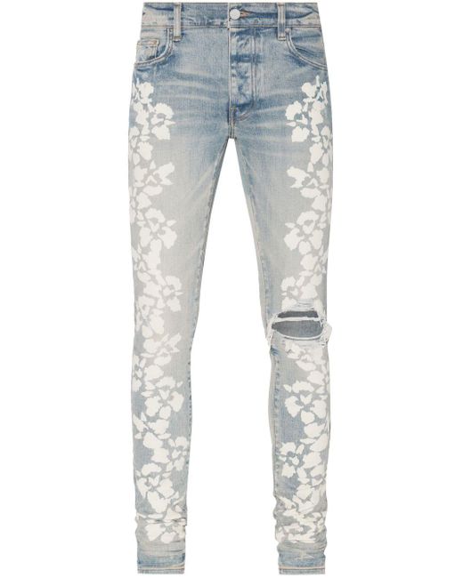 Amiri Blue Hibiscus Floral-print Skinny Jeans for men