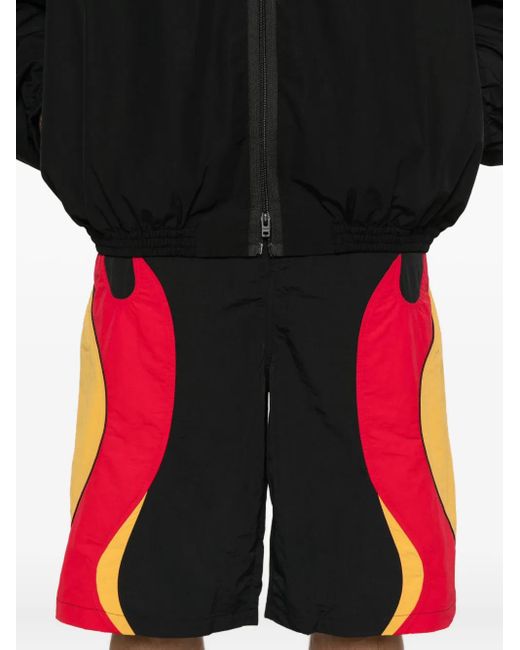 Shorts Rider Con Stampa di Kusikohc in Red da Uomo