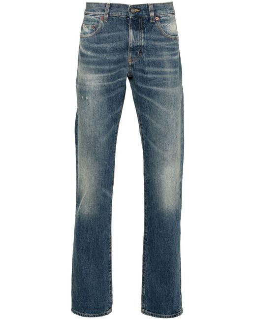 Jeans slim a vita bassa di Saint Laurent in Blue da Uomo