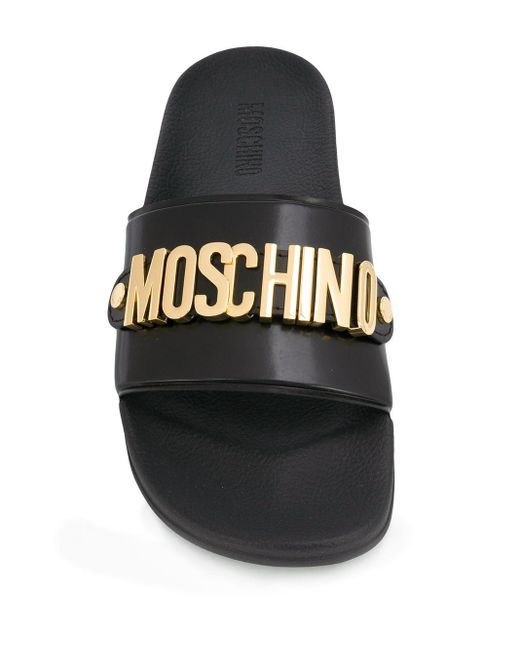 Sandalias \u0026 Slides Hombre | Moschino Sandalias Jelly con logo Lettering  Negro | Donni Reddington