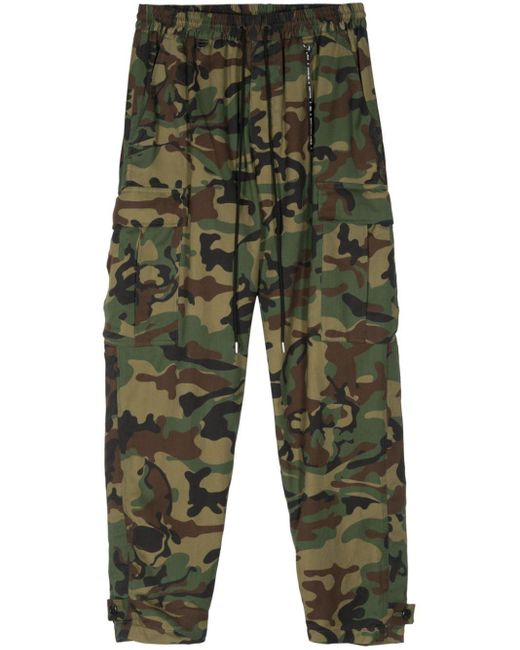 MASTERMIND WORLD Green Camouflage-print Tapered-leg Trousers for men