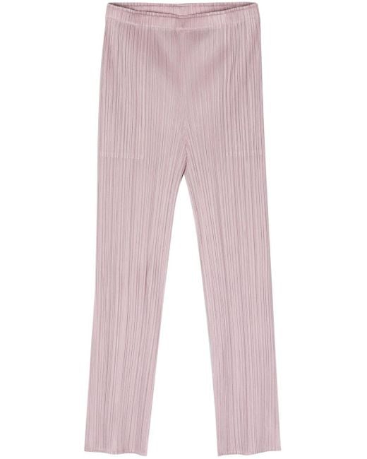 Pantalon fuselé à design plissé Pleats Please Issey Miyake en coloris Pink