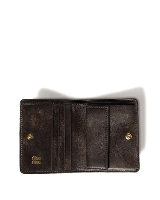 Cartera de matelassé Miu Miu de color Black