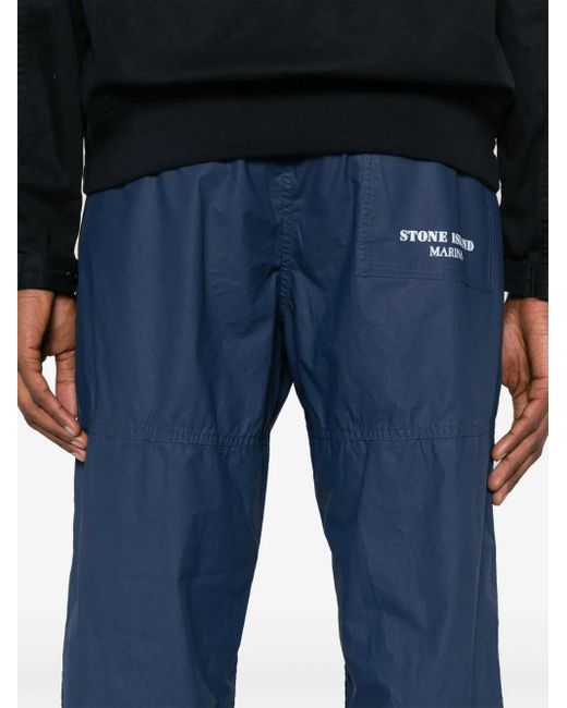 Stone Island Blue Logo-Print Trousers for men