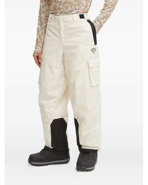 Pantalones de esquí con bolsillos cargo Guess de hombre de color Natural