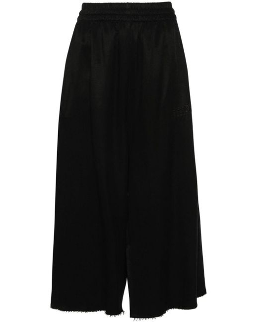 Pantalones cortos anchos con números bordados MM6 by Maison Martin Margiela de color Black
