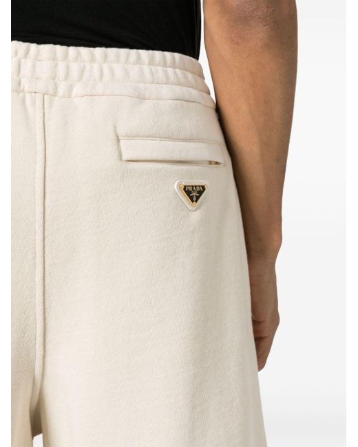 Pantalones cortos de deporte con logo triangular Prada de hombre de color White