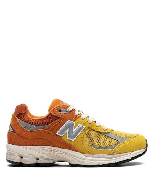 New Balance Orange 2002R Sneakers Mit Schnürung