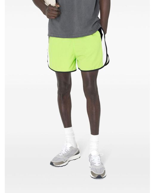 Shorts con design color-block di John Elliott in Green da Uomo