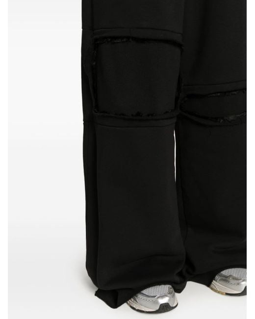 Distressed sale track pants