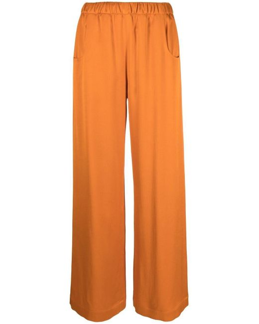 orange satin trousers