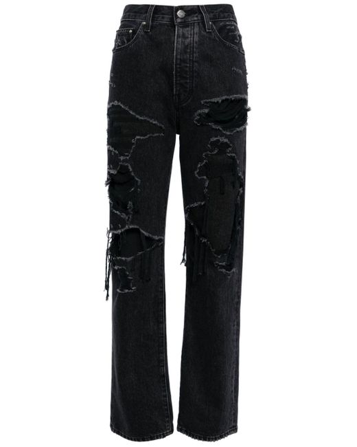 Jeans dritti con effetto vissuto di Amiri in Black