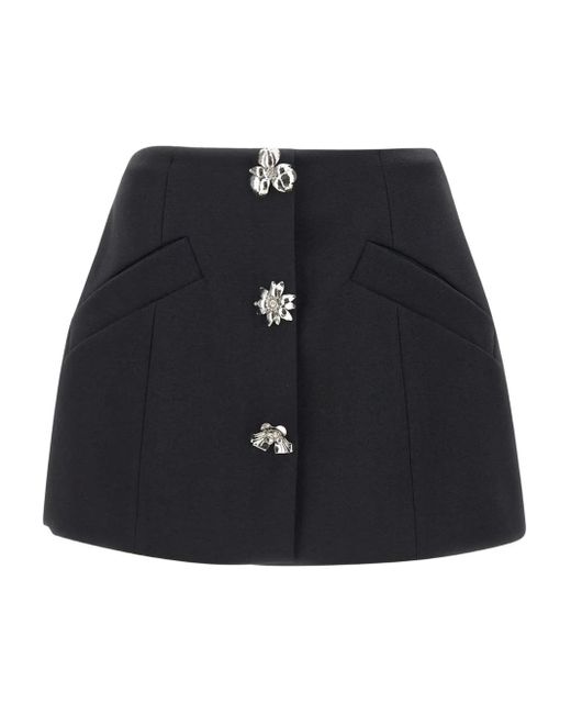 Minifalda con aplique floral Blumarine de color Black