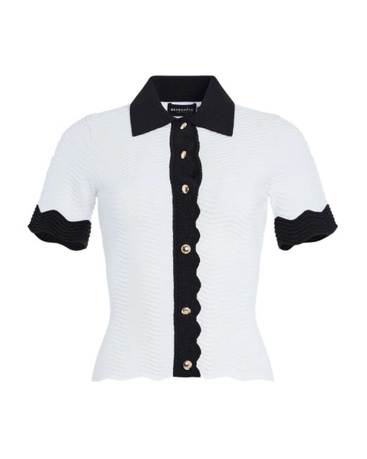 retroféte Black Lyric Oberteil mit Wellensaum