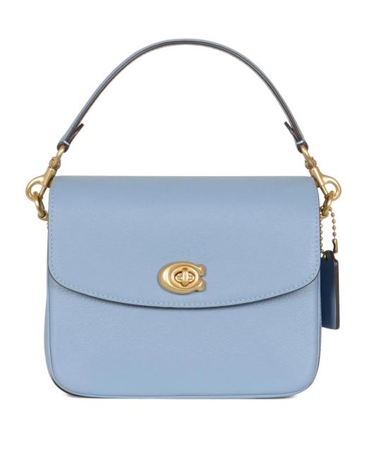Bolso Cassie mini con asa y cierre giratorio COACH de color Blue