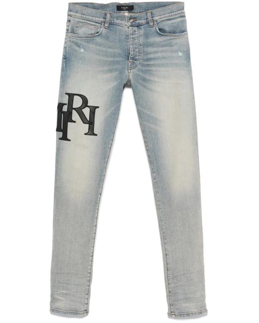 Amiri Blue Staggered Logo Skinny Jeans For for men