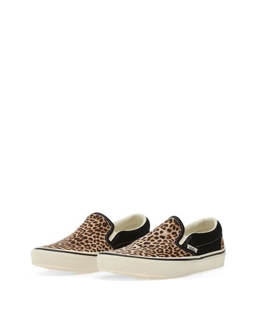 Vans White Classic Slip-On Sneakers