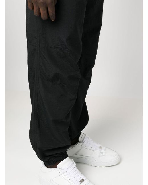 Pantaloni con coulisse di Marcelo Burlon in Black da Uomo