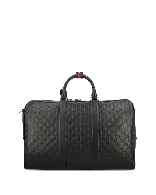 Gucci Black Medium Gg Emblem Embossed Holdall for men
