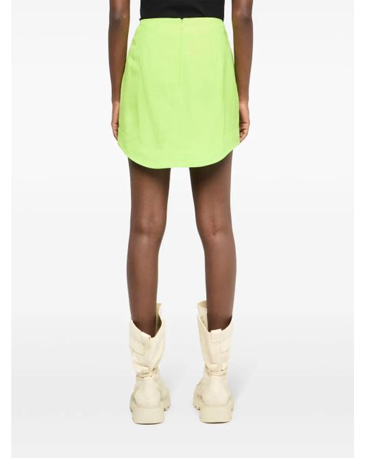 J.W. Anderson Green Curved-Hem Mini Skirt