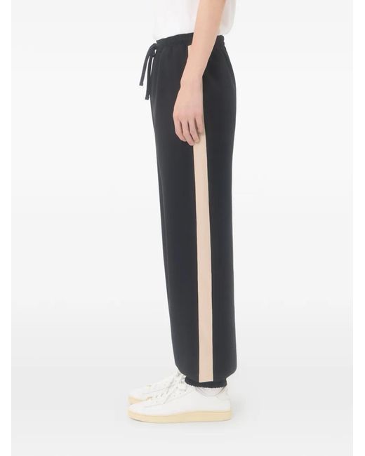 Valentino Garavani Blue Nylon Trousers With Vgold for men